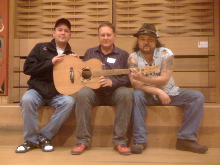 Gary performing at UVIC on the six string nations guitar